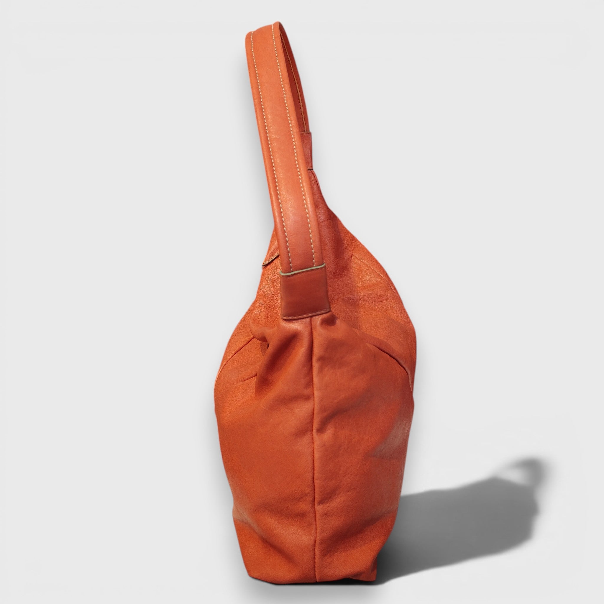 ARISA PICCOLA in orange leather