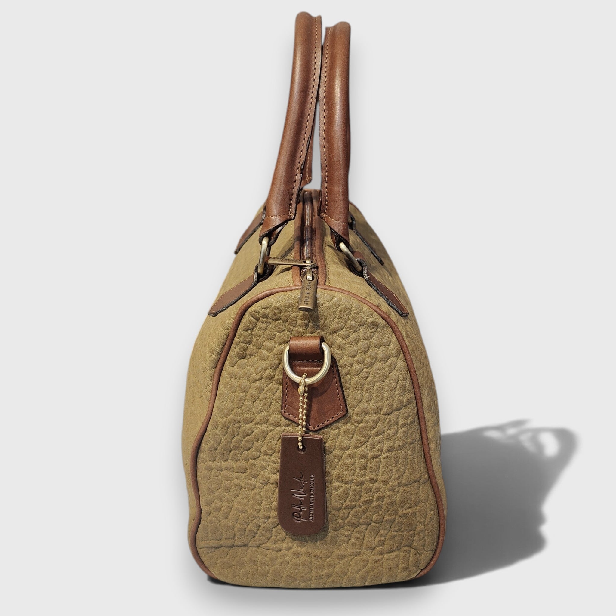Pelletteria Pelle Nuda Milano, Vera pelle italiana, Negozio borse donna, Baule medio verde