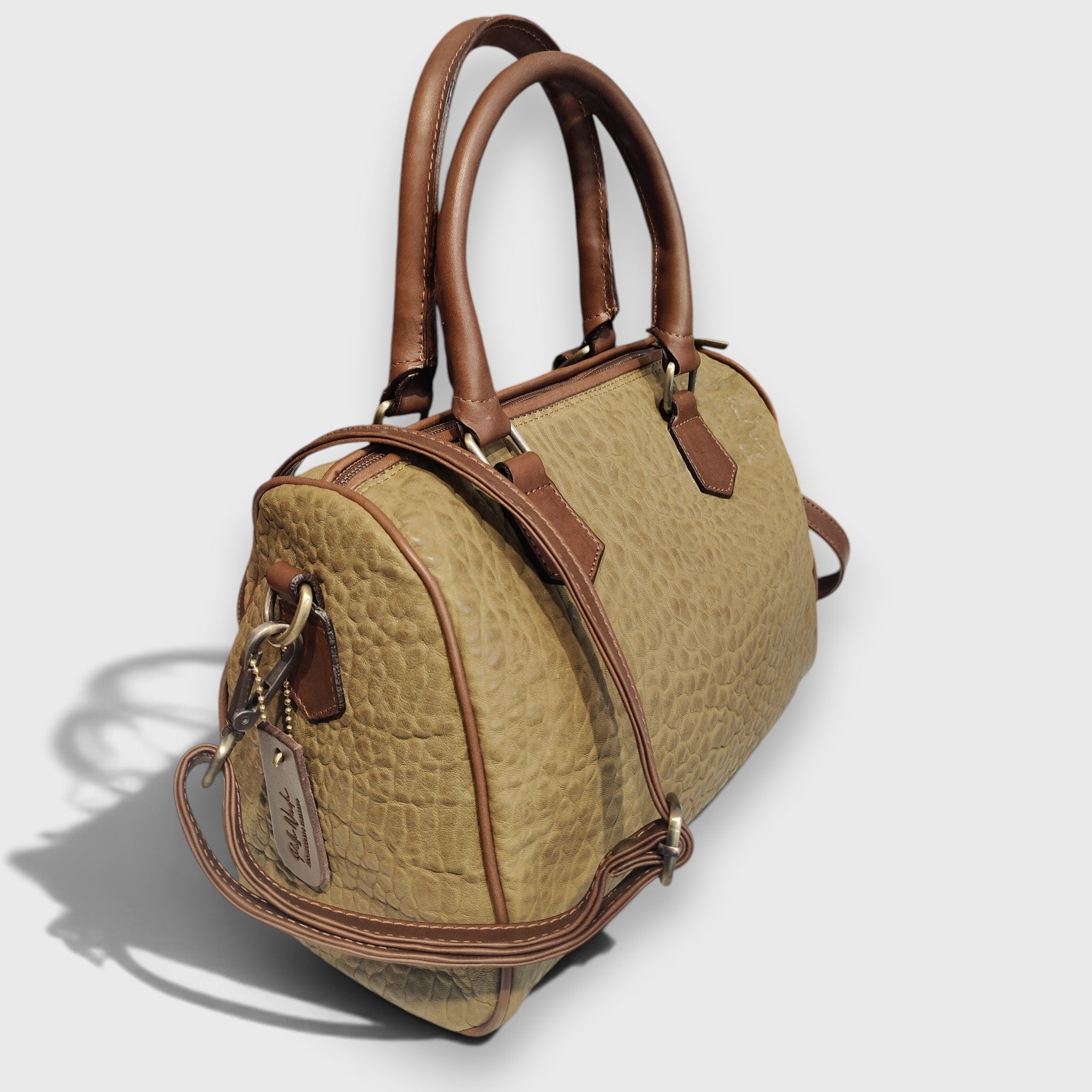 Pelletteria Pelle Nuda Milano, Vera pelle italiana, Negozio borse donna, Baule medio verde