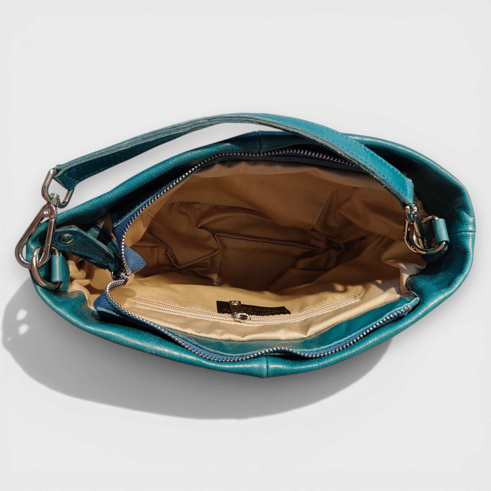 Pelletteria Pelle Nuda Milano, Artigianato Italiano, Vera Pelle, Negozio Borse donna, Sara petrolio