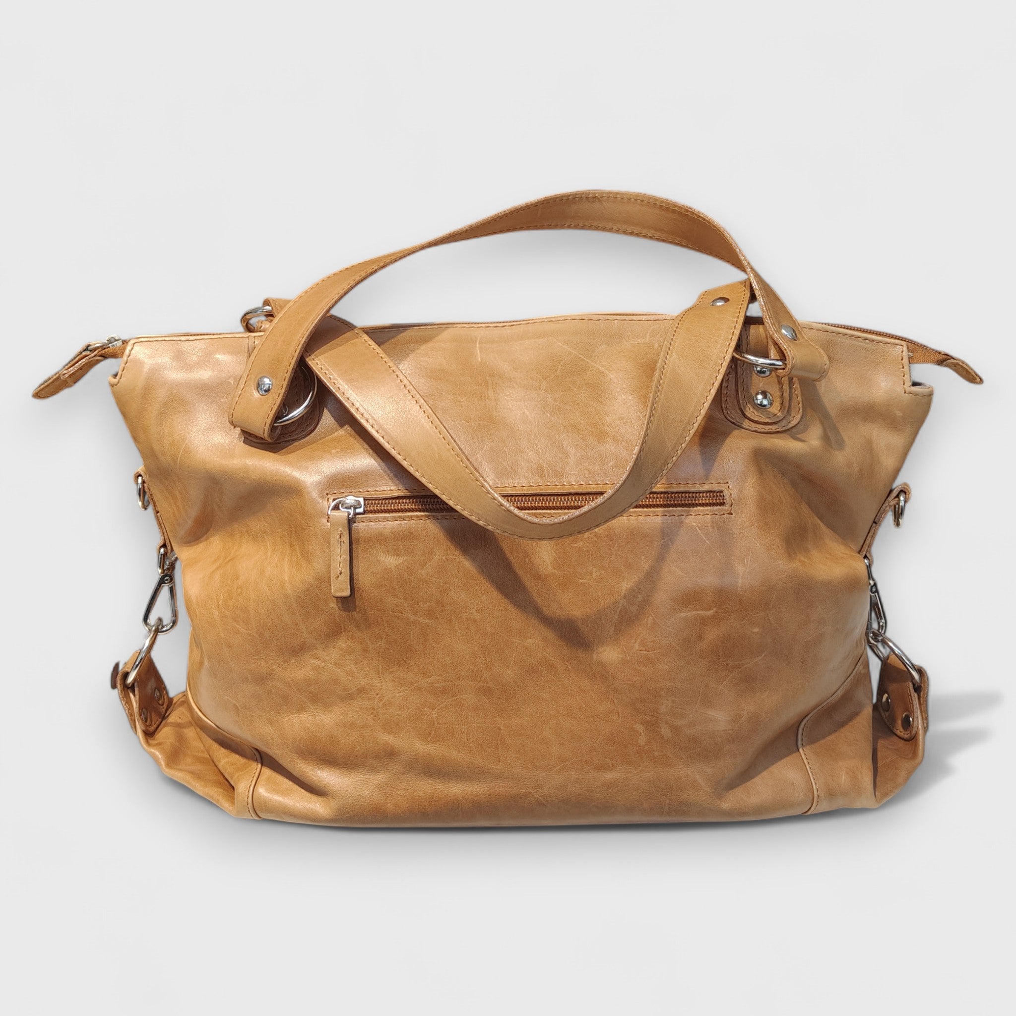 Pelletteria Pelle Nuda Milano, Artigianato Italiano, Vera pelle, Negozio Borse viaggio, Torino miele