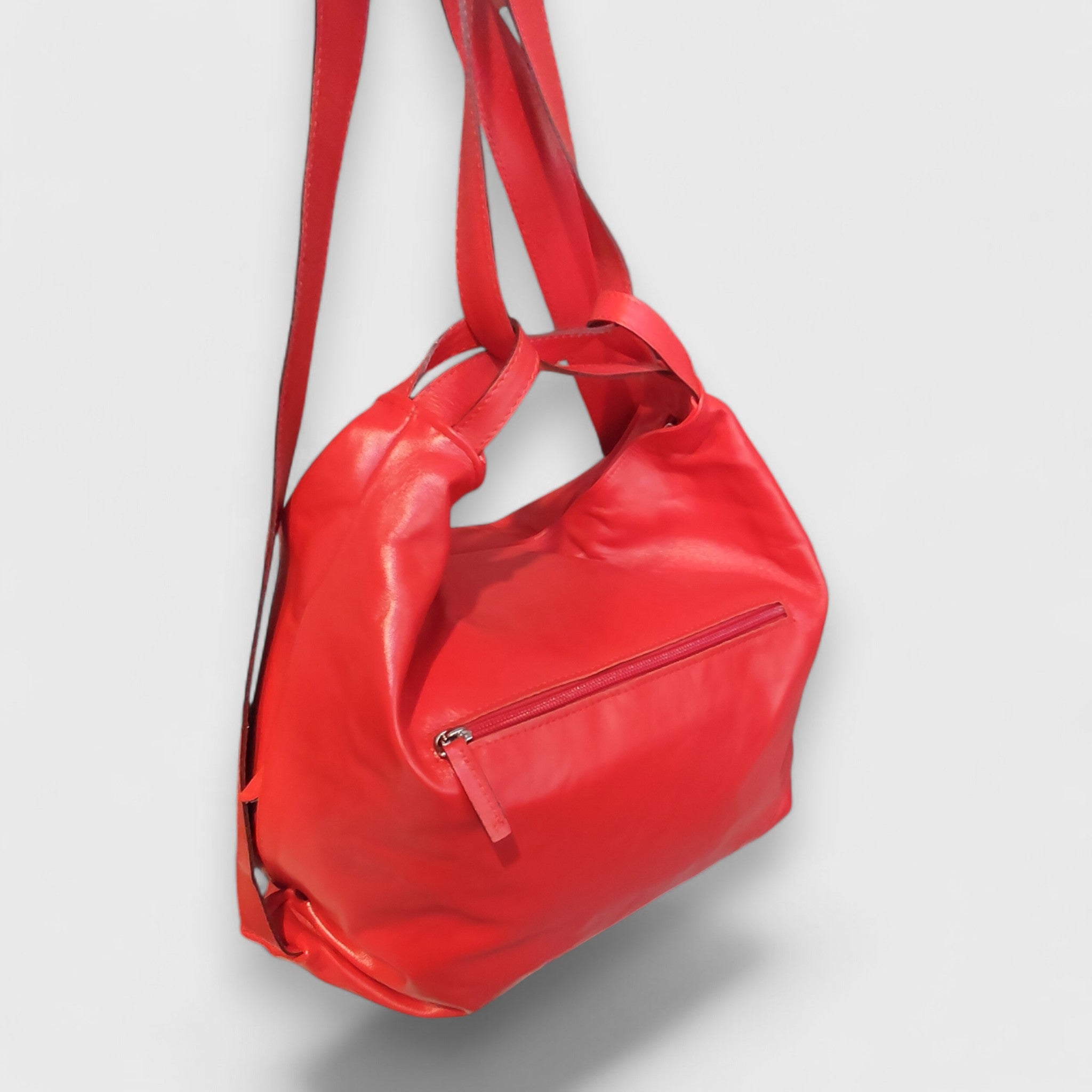 Pelletteria Pelle Nuda Milano, Vera pelle italiana, Negozio borse donna, Zaino Roma rosso