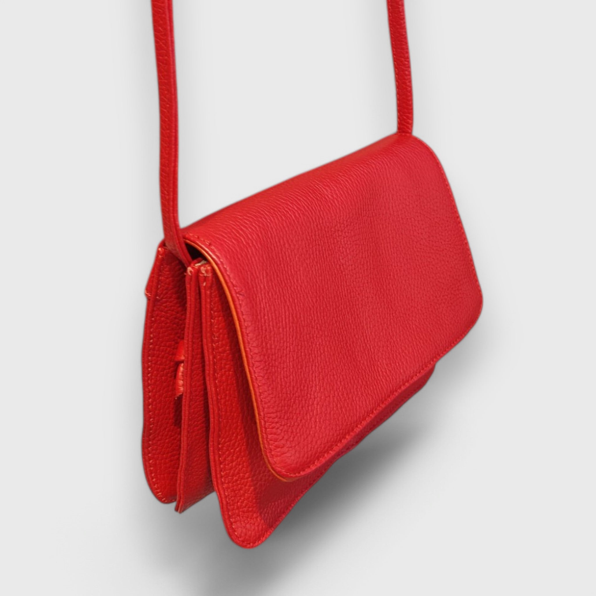 Pelletteria Pelle Nuda Milano, Artigianato italiano, Negozio borse donna, Vera pelle, Tre soffietti rosso