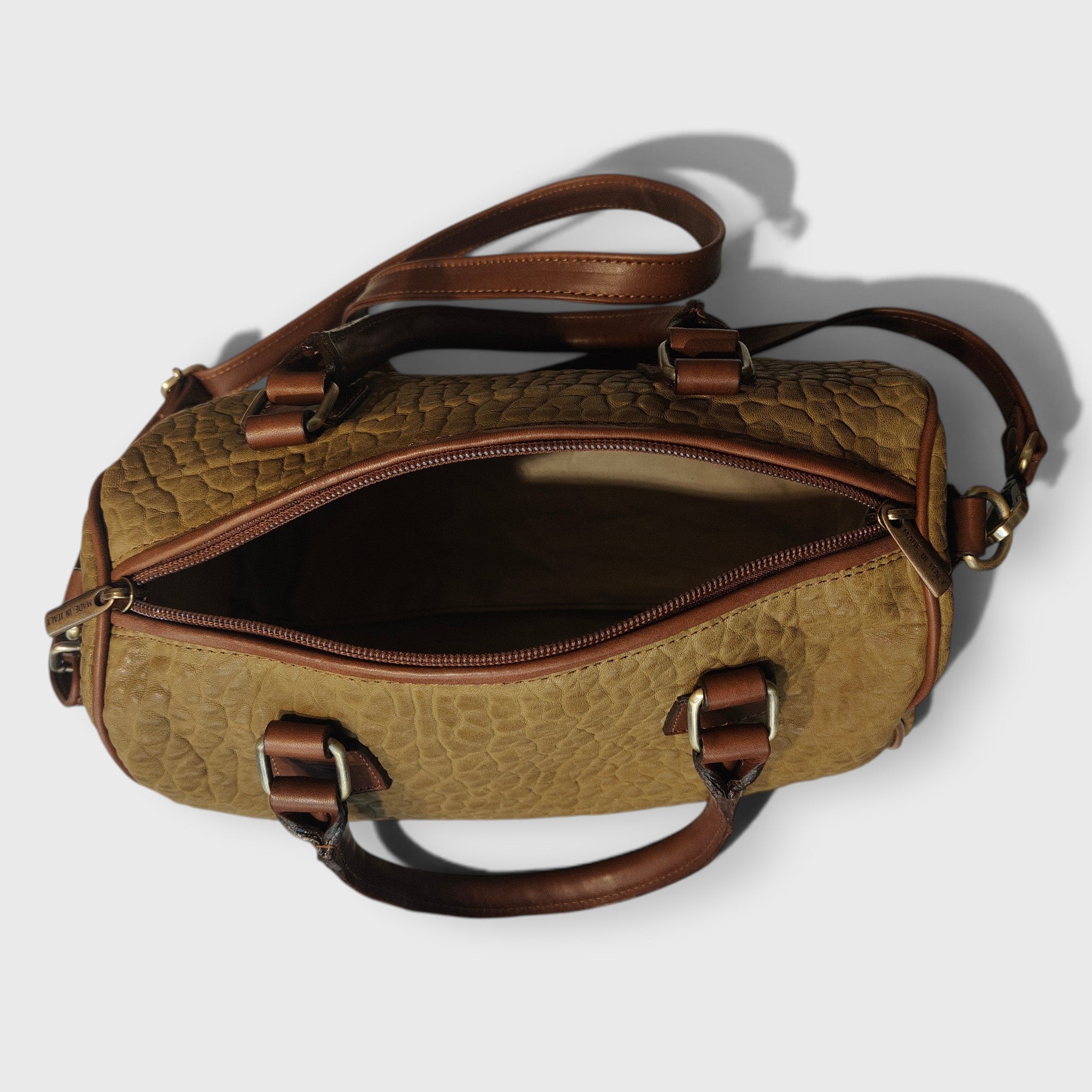 Pelletteria Pelle Nuda Milano, Vera pelle italiana, Negozio borse donna, Baule medio verde