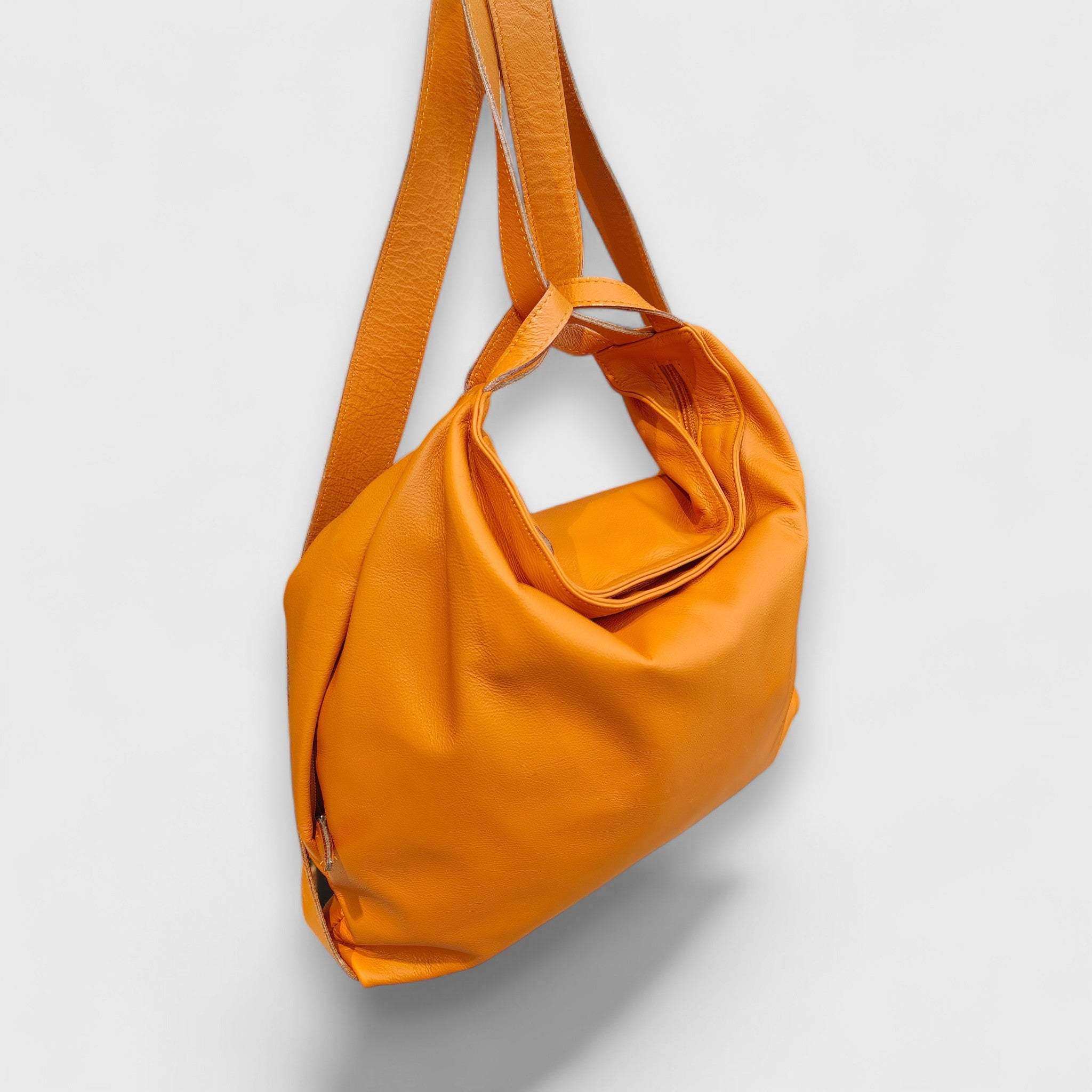 Pelletteria Pelle Nuda Milano, Artigianato Italiano, Vera pelle, Negozio borse donna, Zaino Roma arancione