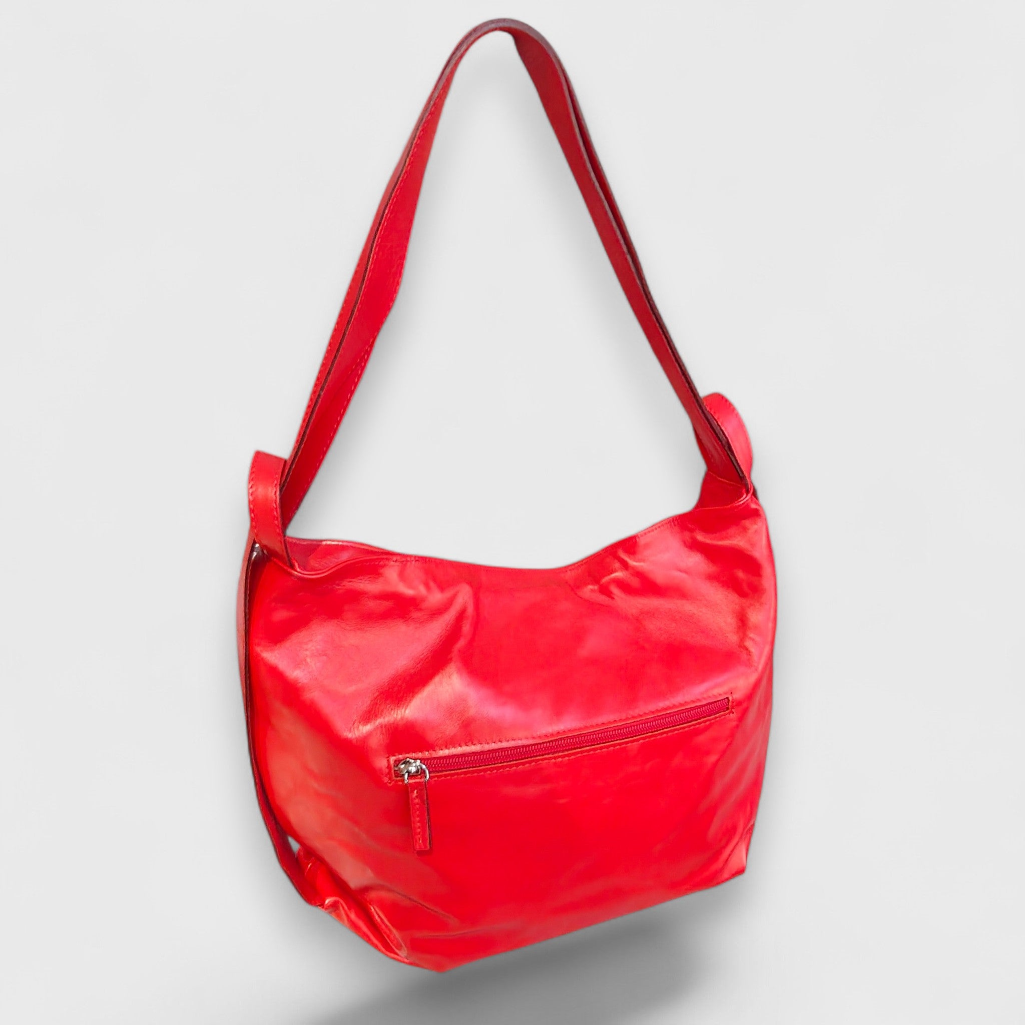 Pelletteria Pelle Nuda Milano, Vera pelle italiana, Negozio borse donna, Zaino Roma rosso