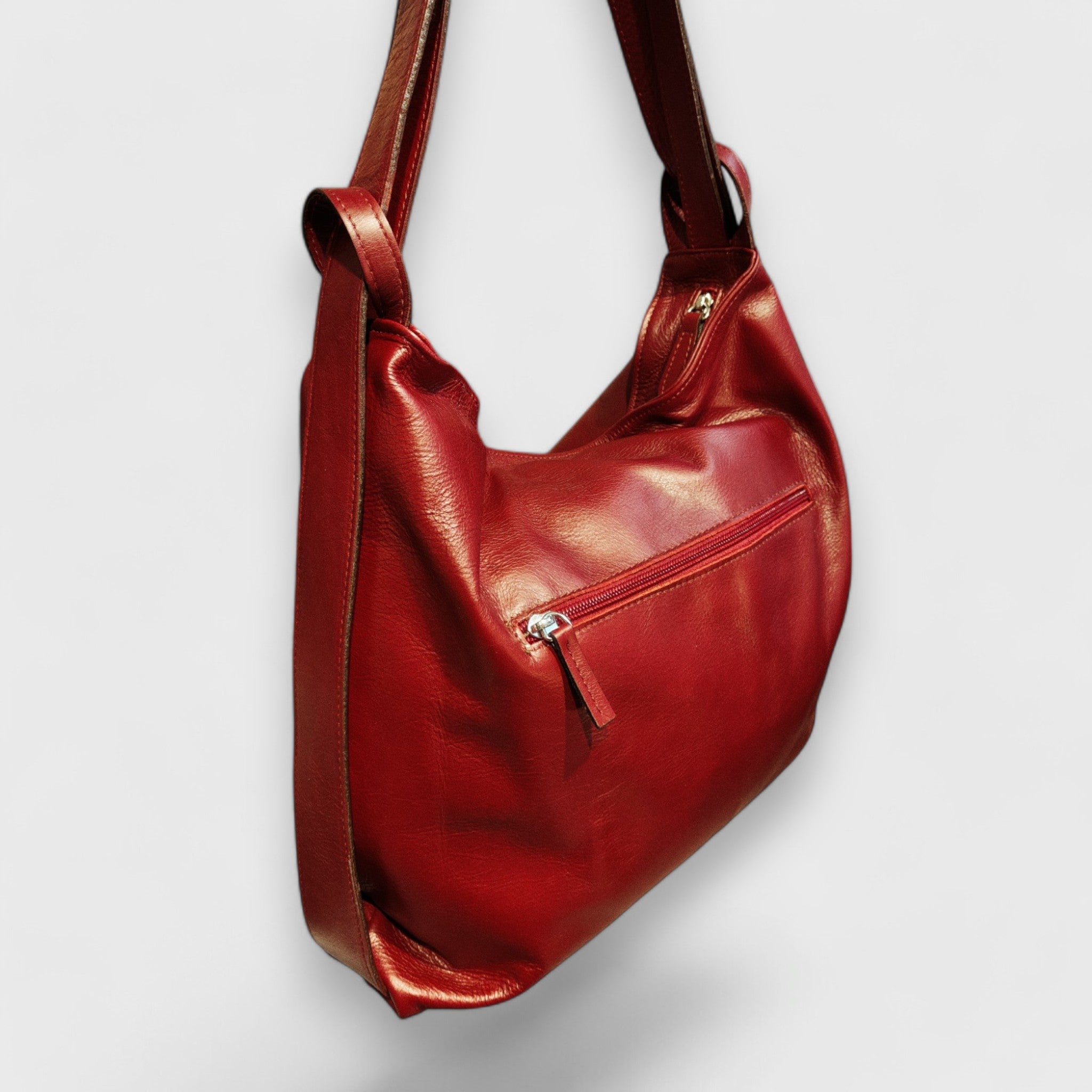 Pelletteria Pelle Nuda Milano, Artigianato italiano, vera pelle, negozio borse donna, Zaino Roma rosso