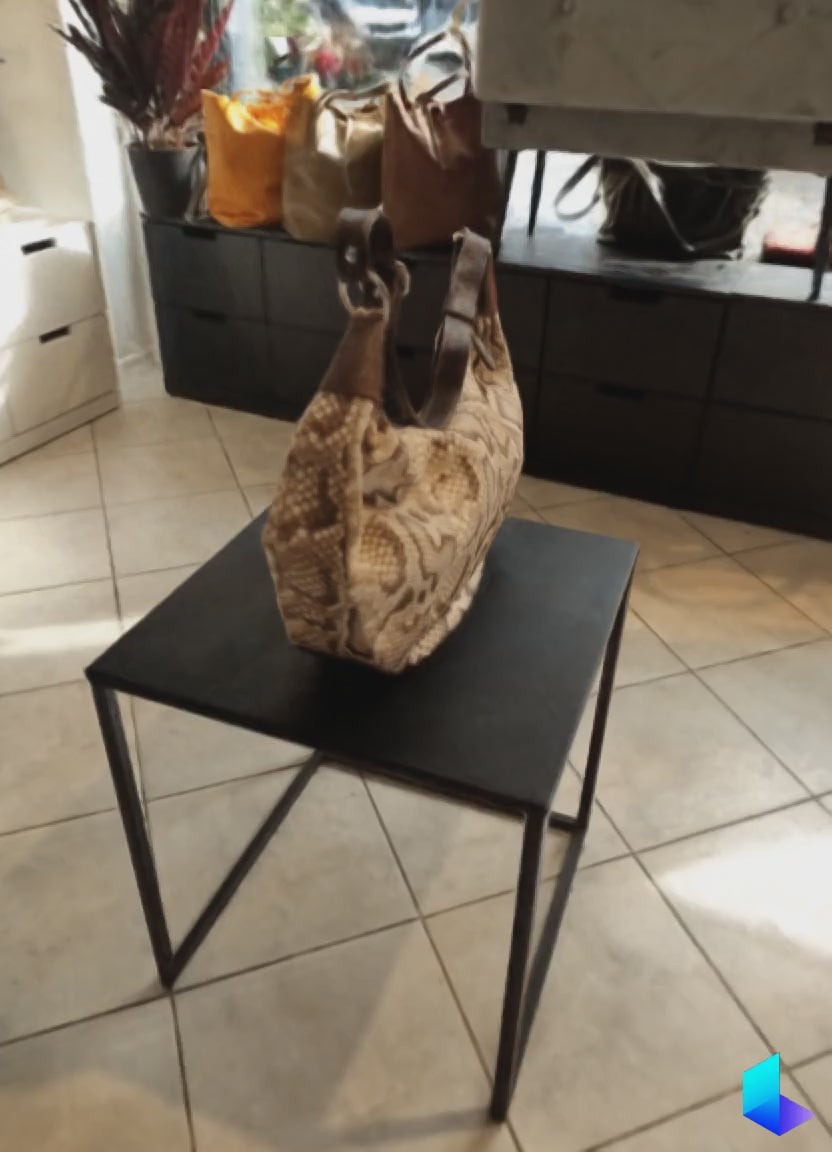Pelletteria Pelle Nuda Milano, Artigianato italiano, vera pelle, borsa donna, Banana in pitone